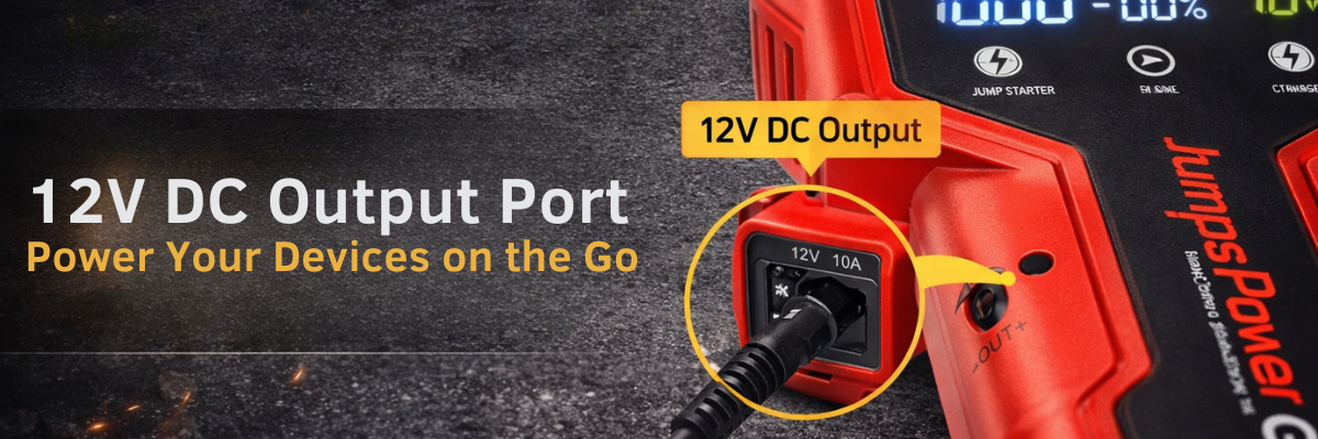 Red jump starter with 12V DC output port on a dark background