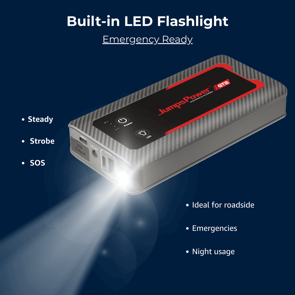 Jump starter with built-in LED flashlight on a dark