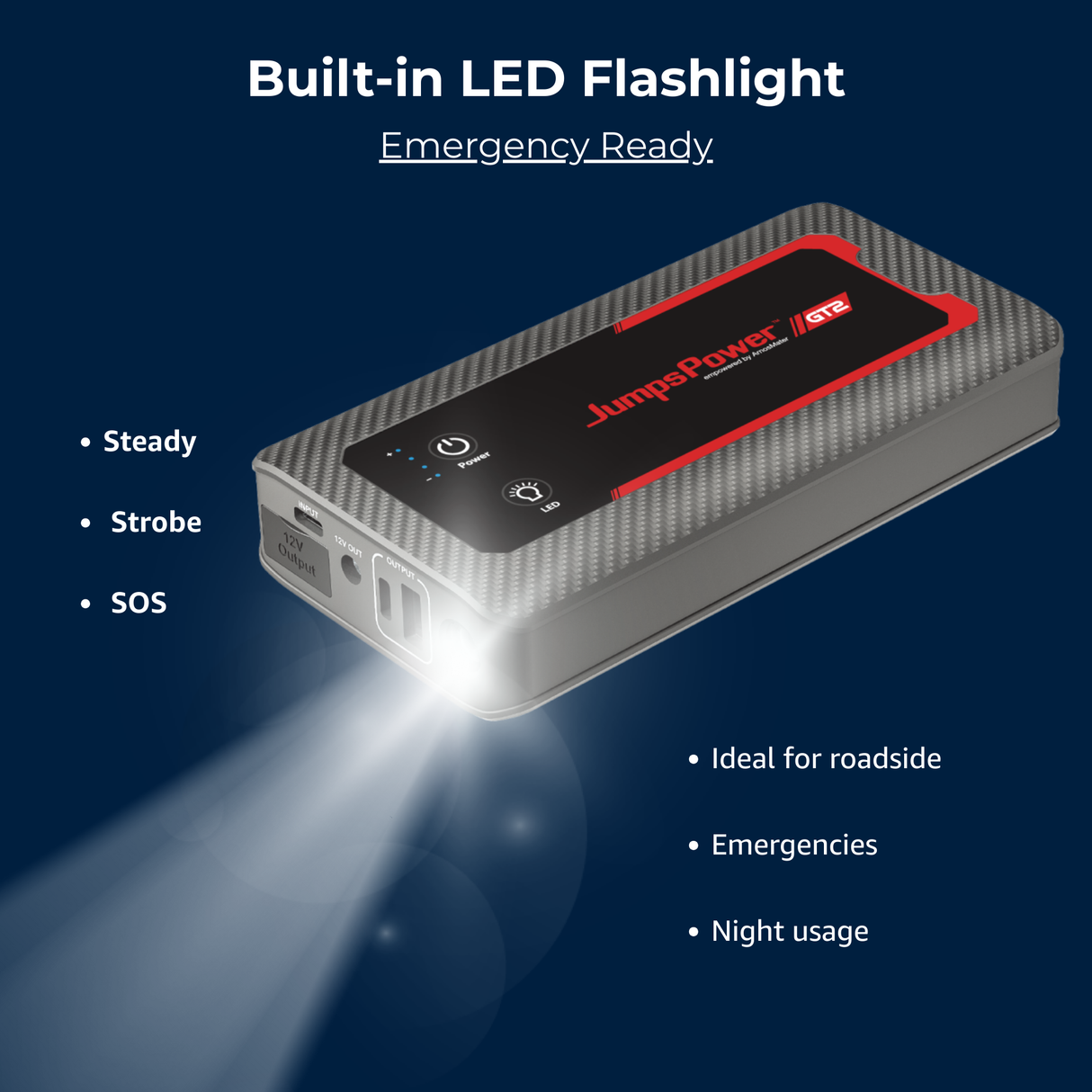 Jump starter with built-in LED flashlight on a dark