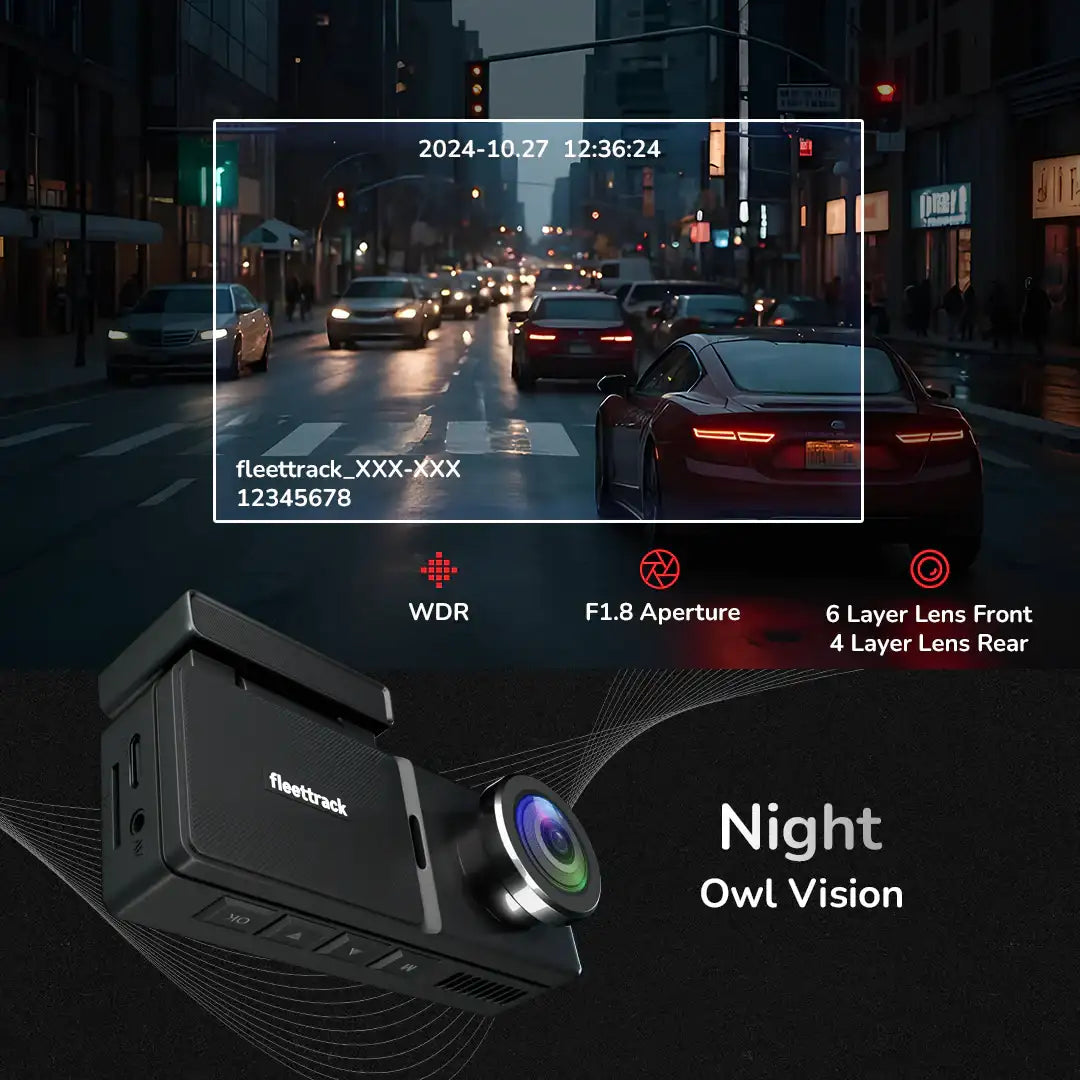 Car dashboard camera with night vision feature on a city street at night.