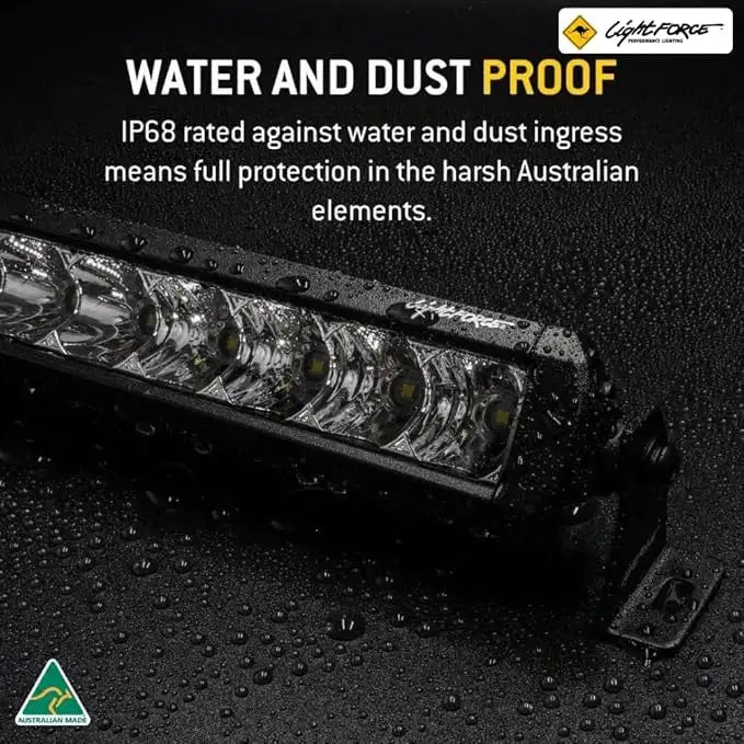 Side view of Lightforce 6" Viper fog light emitting a bright beam.