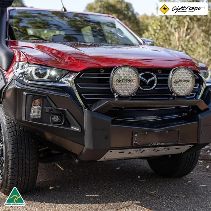 "Genesis LED light by Lightforce, 6-inch round design with advanced optics for enhanced visibility in all terrains."