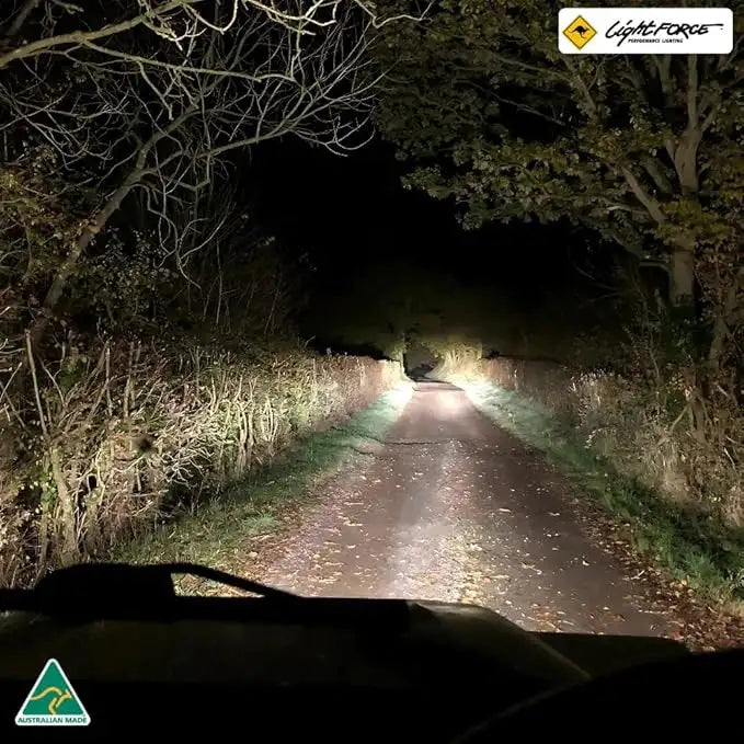 LightFORCE Striker 170mm fog light in action on off-road terrain.
