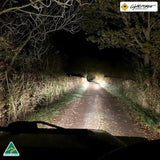 LightFORCE Striker 170mm fog light in action on off-road terrain.
