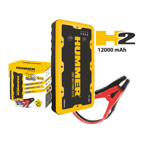 "HUMMER H2 Jump Starter connected to a car battery, providing power to start the engine safely."
