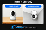 Instruction graphic showing a white security camera in two installation modes: placed on a tabletop on the left and mounted on a ceiling on the right, with the headline 'Install it your way' and a note that it takes just 60 seconds to install and it's done!'.